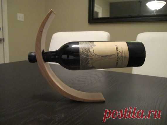 Stunning balancing wine bottle holder by HoffmasterWoodworks