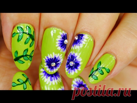 Nail Art. Green Design with Purple Flowers.