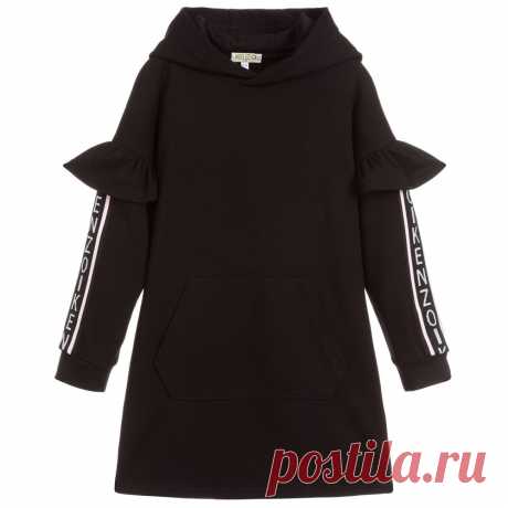 Girls Black Hooded Dress Girls black hooded dress by Kenzo Kids, made in soft and comfortable viscose jersey in a relaxed fit. The dropped sleeves have pretty frilled details with pale pink, grey and black knitted logo tape along the outside seams.
