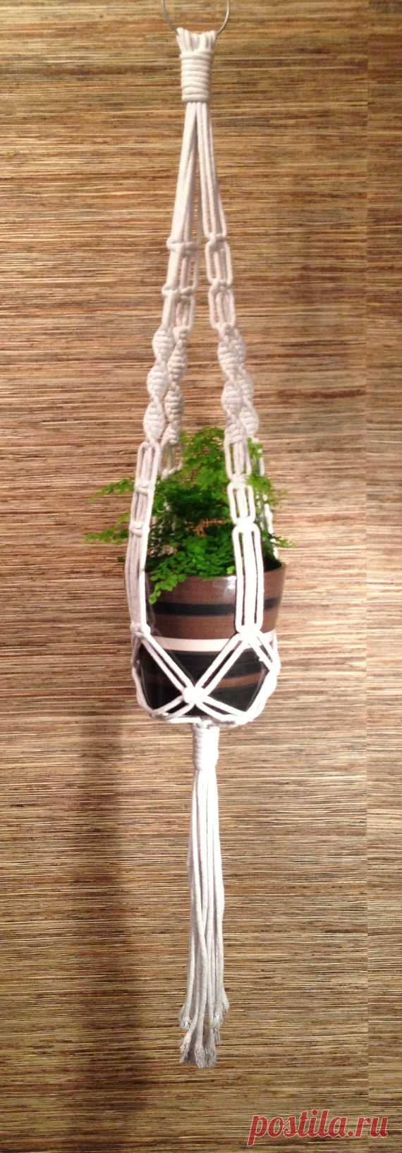 Macrame Plant Hanger / Basket Hanger - White Hand crafted on the Gold Coast in Australia, this hanger is 110cm from the top to the bottom of the fringe, and 70cm from the top to the bottom of the pot. Suits a pot or bowl approximately 15cm wide.    Made with cotton rope, this hanger is great for indoor or outdoor use.    This item is very eye catching and looks great with a potted plant, or bowl for fruit or vegetables in it (the pot in this picture is not included).