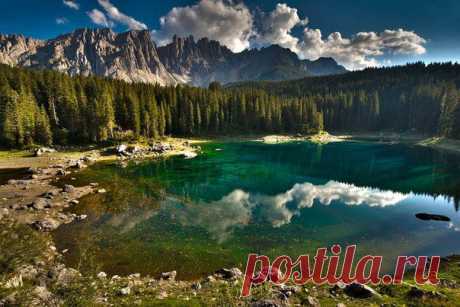 Карецца - озеро в Доломитах в Южном Тироле, Италия / Богатая добыча