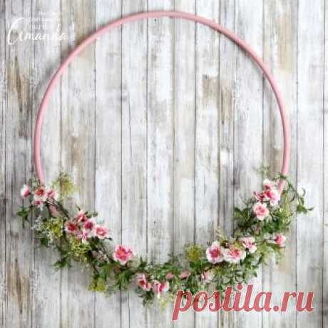 This cherry blossom hula hoop wreath will make a cheery addition to your spring décor. Hang it above your mantel or on your wall for a pop of spring color.