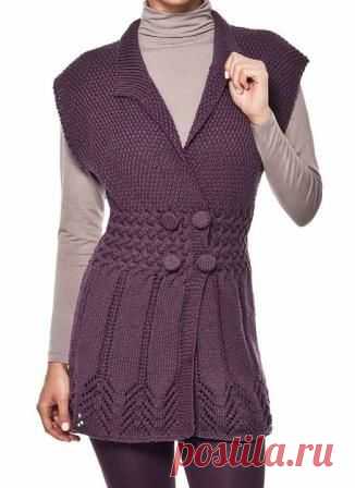 Теплая туника спицами Размер: 40/42 Вам потребуется: 4 мотка пряжи Cisne Merino Coats Corrente (50% акрил микрофибра, 50% мериносовая шерсть, 236м/100г, цвет 1079) фиолетового цвета; Спицы №3,5 и 4; Игла для сшивания; 4 пуговицы Узоры: Резинка 1 х 1: попеременно 1 лиц.