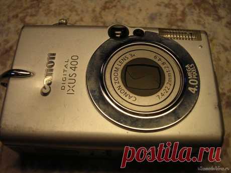 Фотоаппарат CANON IXUS 400 с «рычанием» Принес в ремонт мальчик аппарат. В квитанции записано «следы потертости, на фронтальной панели вмятина в районе фирменной надписи». Неисправности со слов клиента «при включении рычит»! Очередной пациент у меня на столе, сейчас посмотрим в каком месте «рычит» маленькая железячка. Подтягиваю