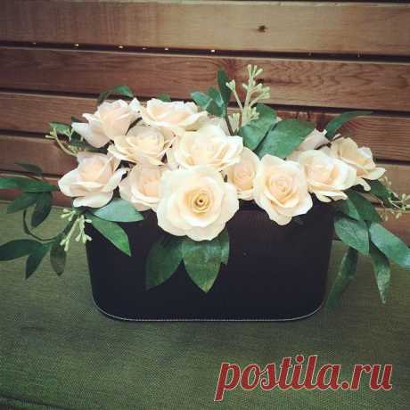 It's been busy around here with the studio reorganization, submitting jewelry to the stylist of a hit tv show, and several last-minute orders for first #anniversary gifts. Here's one of the anniversary arrangements, which uses apricot roses and seeded eucalyptus just like the recipient's bridal #bouquet, and is in a textured black leather container. #paperflowers