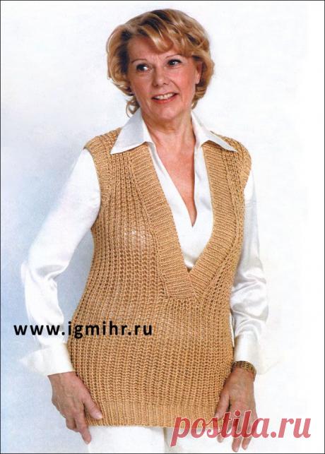 Длинная бежевая безрукавка, от финских дизайнеров. Спицы.