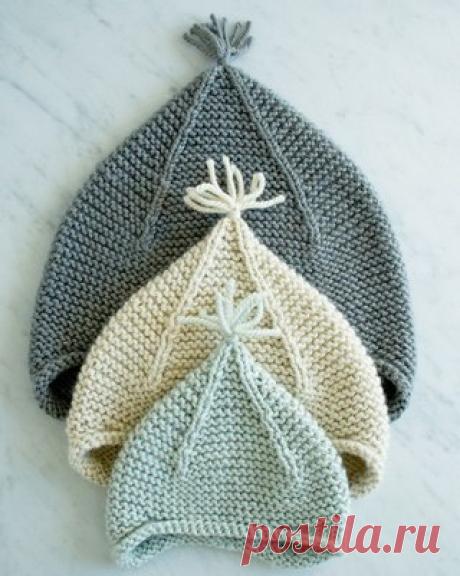 Понравилась шапулька.. Перевод даю так, как обпубликовано в инете
Garter Ear Flap Hat

Материалы
• 1 (1, 1, 1, 2, 2) мотка(ы) Purl Soho чистая альпака, 100% альпака. Я использовал цветов семейной реликвии белая (Artemisia, Storm Gray) для ребенка (ребенок, взрослый средний) hat. 
• US #8 12 (детские размеры) или 16-дюймов круговой иглы 
• США, #7 12 (детские размеры) или 16-дюймовый циркуляр иглы 
• Набор из нас #7 двойные остроконечные иглы 
• 4 съемные маркеры стежка 
• ...
