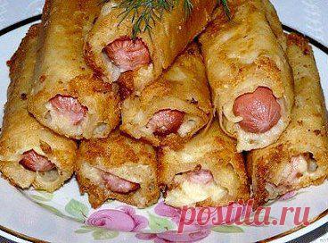 «Ленивые пирожки». Сосиска с картофелем в лаваше. Безумно вкусно, сытно и просто! Никакой духовки! Можете заменить сосиски фаршем, но по-моему сама суть блюда в сосиске! Очччень вкусно! Рецепт тут - kp.by/go/http://top.unichef.ru/kulinariya/sosiska-v-lavashe/