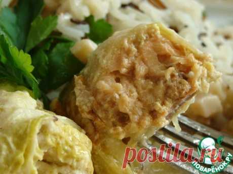 Рыбные голубцы из пекинской капусты с соусом из кальмаров - кулинарный рецепт
