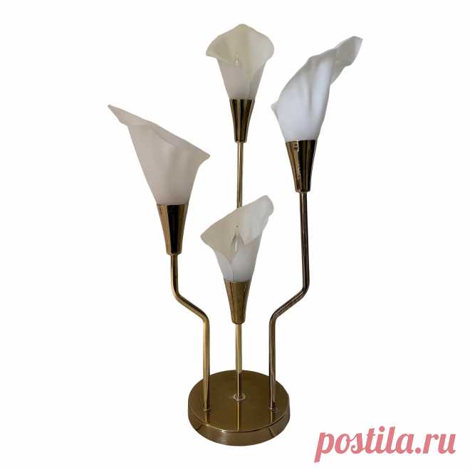 Vintage 1980s Underwriters Laboratories Calla Lily Table Lamp Underwriters Laboratories Portable Lamp. Vintage 1980's Calla Lily Table Lamp. This lamp has four calla lily stems with plastic flowers. Brass stems and base. She's in stunning condition with no scratches, cracks, or breaks. All four lights work on a four way switch. Minimal imperfections as shown in photos. Minor discoloration on the base near a stem. Minor discoloration on brass holding the lily. The flowers a...