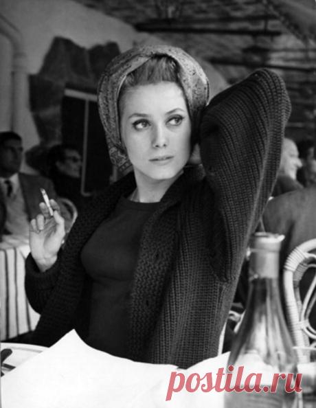 Catherine Deneuve with hair in rollers, 1960