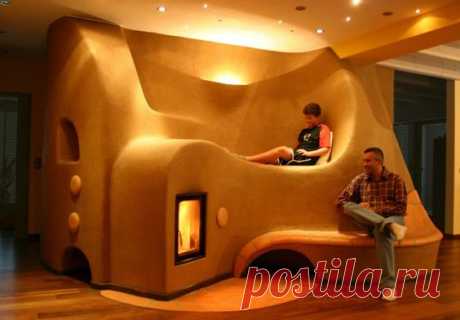 (342) Rocket stove heater built into cob furniture/seating that keeps warm in the winter. | House construction