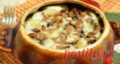 Гречка ,запечённая с  грибами и сыром в горшочке