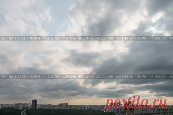 City sky clouds and buildings view from above. Cloudscape, cityscape. (2020 год) Стоковое фото, фотограф Ilaronsia / Фотобанк Лори