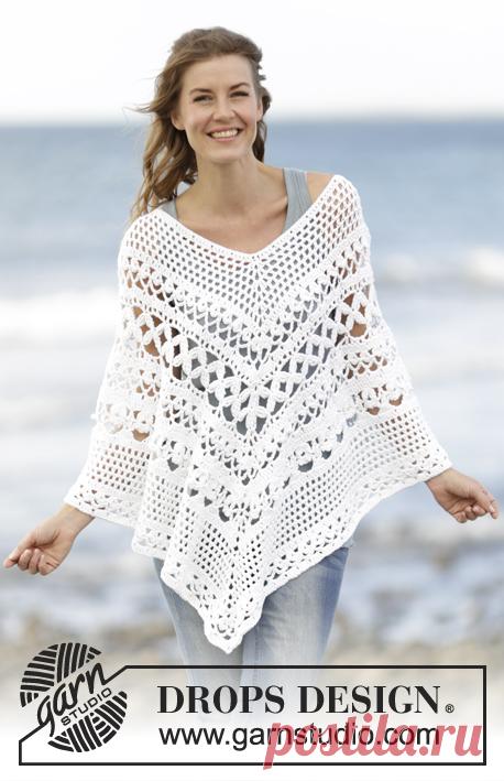 Light's Embrace / DROPS 169-4 - Bezpłatne wzory na szydełko od DROPS Design Ażurowe ponczo DROPS, na szydełku, przerabiane z góry na dół, z włóczki „Paris”. Od S do XXXL.