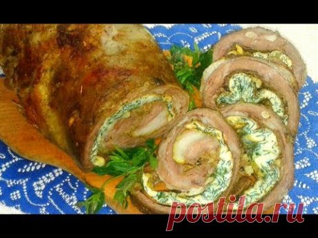 Сочный рулет из свинины с начинкой.Очень вкусный.И на Новый Год