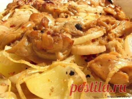Картофель, запечённый с рыбой и печенью трески.