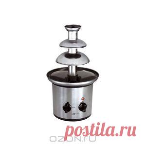 Фонтан для расплавленного шоколада Clatronic SKB 3248. Теплый шоколад с помощью шнекового вала подается на вершину фонтана, потом плавно и непрерывно стекает вниз