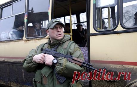 Февраль 2015. БОИ В РАЙОНЕ ДЕБАЛЬЦЕВА И ПЕРЕГОВОРЫ &quot;НОРМАНДСКОЙ ЧЕТВЕРКИ&quot; / Украинский солдат в городе Дебальцево Донецкой области, 3 февраля 2015 года. © AP Photo/Petr David Josek| Что привело к возникновению конфликта, как он развивался и какое влияние оказал на расстановку сил в международных отношениях. ХРОНОЛОГИЯ