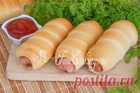 Сосиски в дрожжевом тесте Сегодня предлагаю рецепт сосисок в дрожжевом тесте – простой, вкусной и сытной домашней выпечки.