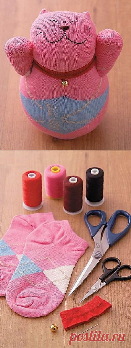 Игрушка — кот из носка.