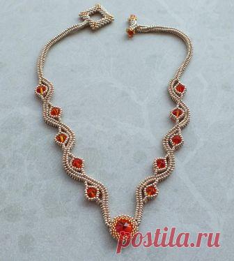 Swarovski Element Herringbone Necklace Swarovski Herringbone Necklace  12 x 6mm Swarovski Bicones  1 x 12mm Swarovski Rivoli  All Swarovski are Fire Opal in Colour  11/0 Miyuki Yellow Gold 15/0 Miyuki Gold  Herringbone Stitch and Peyote used  Toggle Clasp  17 in length   Due to the shipping setup, Etsy uses it is