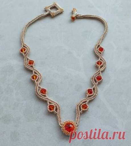 Swarovski Element Herringbone Necklace Swarovski Herringbone Necklace  12 x 6mm Swarovski Bicones  1 x 12mm Swarovski Rivoli  All Swarovski are Fire Opal in Colour  11/0 Miyuki Yellow Gold 15/0 Miyuki Gold  Herringbone Stitch and Peyote used  Toggle Clasp  17 in length   Due to the shipping setup, Etsy uses it is
