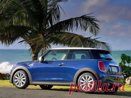 Фотография автомобиля MINI Mini (поколение II) - Mini Cooper 2014 вид сбоку