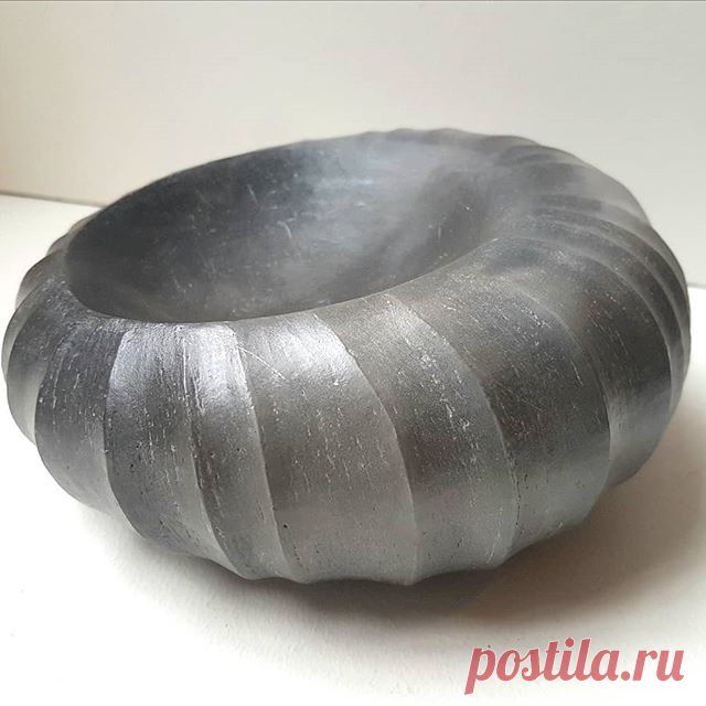Just finished waxing this new smoke fired ribbed form.  I smoke fired two pieces yesterday and the other piece had greater variation in tone but also developed a small crack during smoking so this is the only survivor.