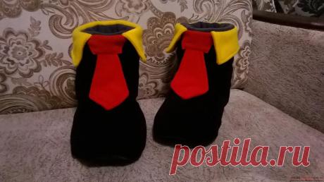 Этот мастер-класс с фото и описанием научит как сшить своими руками оригинальные домашние тапочки для мужчины.