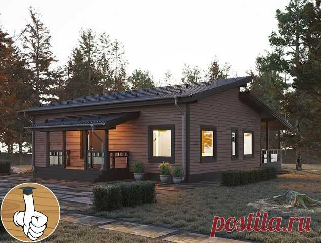 Загородный одноэтажный дом с большими окнами, красивой террасой.