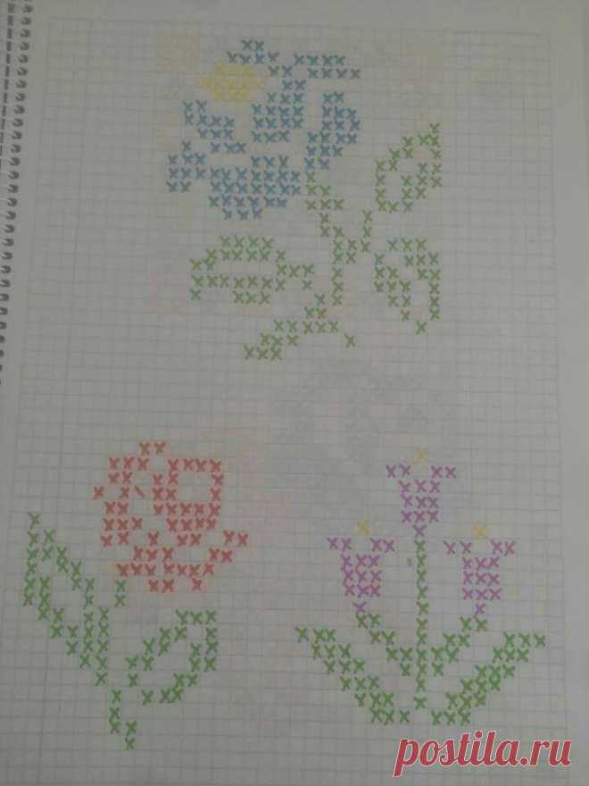 three cross stitch designs on a sheet of paper with the words love written in different colors