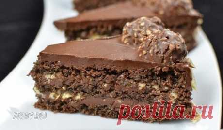 ТОРТ "Ferrero rocher" 
Сохрани, чтобы не потерять 

ИНГРЕДИЕНТЫ:
● 5 больших яиц
● 6 столовых ложек сахара
● 1,75 стакана молотого фундука
● 2 столовых ложки муки
● 2 столовых ложки какао-порошка
● 2 чайных ложки разрыхлителя
● 200 г несоленого сливочного масла комнатной температуры,
● 280 г горького шоколада
● 7 столовых ложек нутеллы
● 200-220 г вафель, наломать до состояния крошки
● 10 конфет Ferrero Rocher

ПРИГОТОВЛЕНИЕ:
1. Яйца взбейте с сахаром до увеличения массы в...