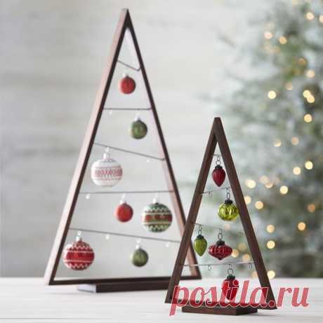 Crate and Barrel's "A Frame Ornament Trees" make for a…