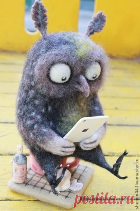 Cute face on this needle felted cat by Olya and Dasha from