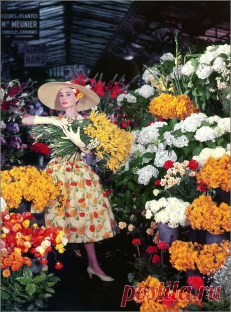 Audrey Hepburn filming one of the fashion scenes wearing dress by Givenchy in "Funny Face", 1956