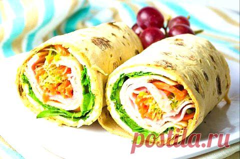 "Ролл" с ветчиной и сыром | Домохозяйки
Ингредиенты:

Лаваш армянский - 1-2 шт
Сыр сливочный - 1 ст.л
Салат - 1 лист
Капуста белокочанная
Морковь
Помидор - 1 шт
Ветчина - 2 ломтика
Куриная грудка
Соль и перец