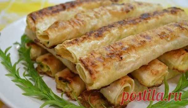 Трубочки с рыбной начинкой - У нас так Вкусная начинка в тонком лаваше и с хрустящей корочкой! Состав: 1 банка рыбных консервов в масле, 6 яиц, 200 г твердого сыра, 3-4 зубчика чеснока, 1 лист тонкого...