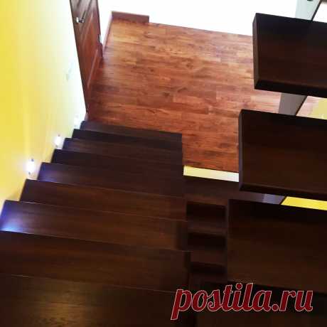 Металлическая лестница облицованная деревом