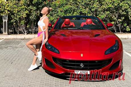 Российская гимнастка попозировала в купальнике рядом с Ferrari. Олимпийская чемпионка по спортивной гимнастике Ангелина Мельникова опубликовала снимки с отдыха в Дубае и восхитила фанатов. На фотографиях 21-летняя гимнастка попозировала в бело-розовом купальнике рядом с красным кабриолетом Ferrari. «Другая реальность», — подписала снимки девушка.