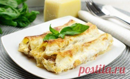 Каннеллони с фаршем
http://povar.ru/recipes/kannelloni_s_farshem-10887.html