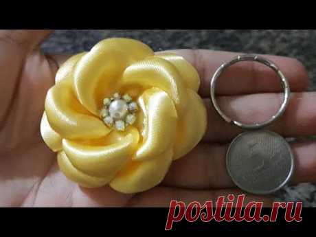 Mine flor boleada. Com moeda de 5ctv.e argola