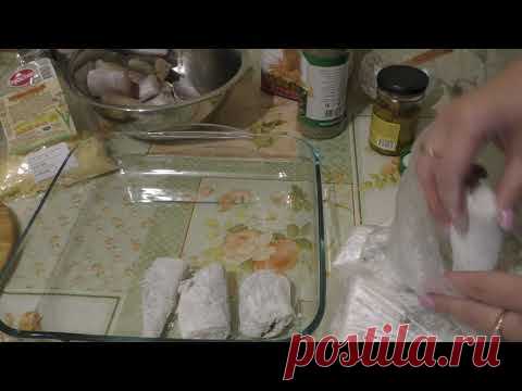 Минтай запеченный под луком и сыром