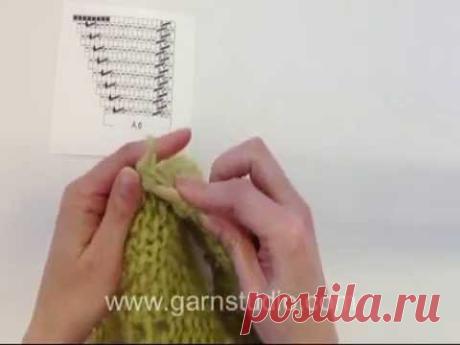 DROPS Knitting Tutorial: How to knit an edge and at the same time binding of st on the shawl.