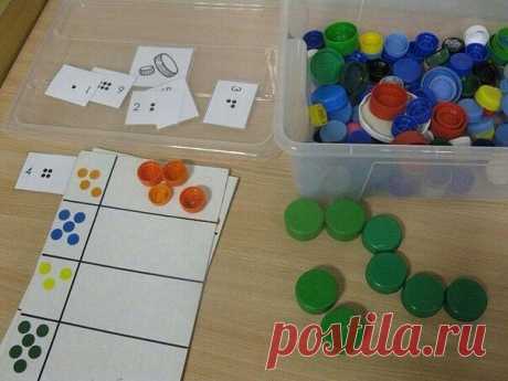 Развивающие игры из пластиковых крышек