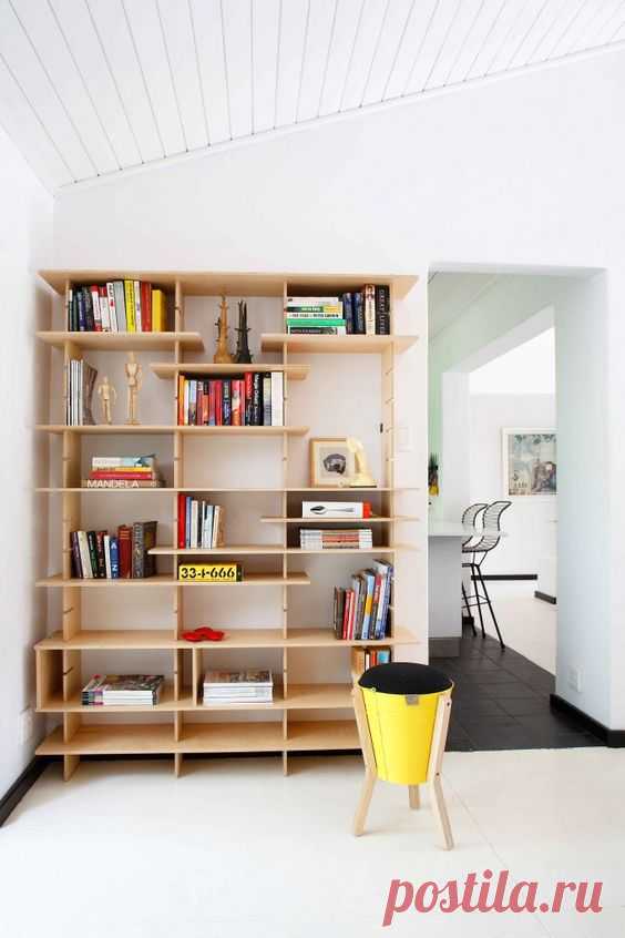 Flexible shelving solution by Pedersen+Lennard. Birch plywood and textured black mild steel fixings were used to expose how the shelf is fastened. …