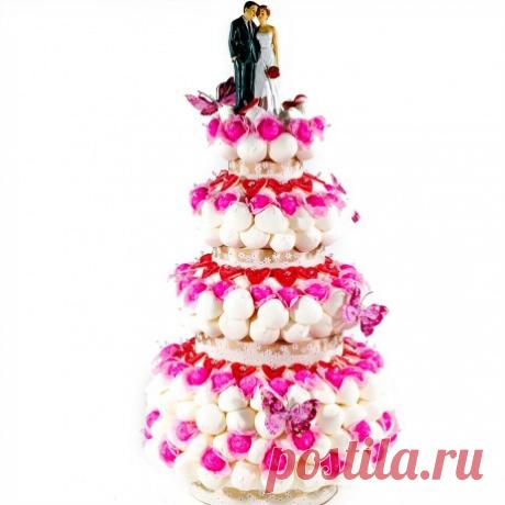 Mariage bonbons - Gateau de bonbon le Coeur de roses Une magnifique pièce montée en bonbons joliment décorée... Une pièce qui décorera à merveille votre table !