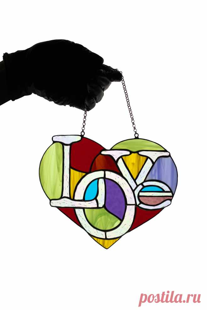 Heart suncatcher Stained glass window hanging Glass garden decor Love  Window hanging suncatcher made of stained glass pieces by my own disign.The heart is a symbol of emotion, including affection and love, especially romantic love.Handmade using Tiffany copper foil technique.Looks amazing in the lights of a sun.You will get it completely ready for installation. It comes with a self-adhes