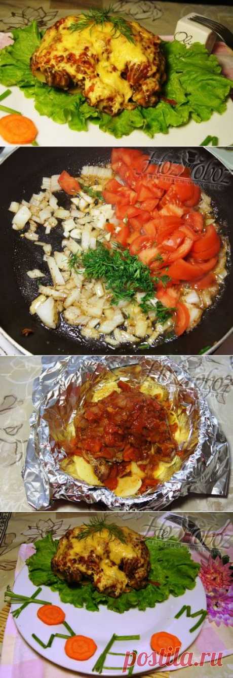Курица под помидорами и сыром