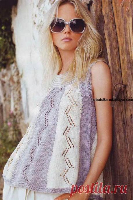 Расклешенный топ спицами Расклешенный топ спицами. Двухцветный топ с вертикальным узором